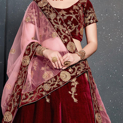 Demanding Maroon Colored Partywear Designer Embroidered Velvet Lehenga Choli