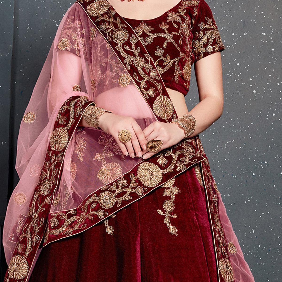 Demanding Maroon Colored Partywear Designer Embroidered Velvet Lehenga Choli