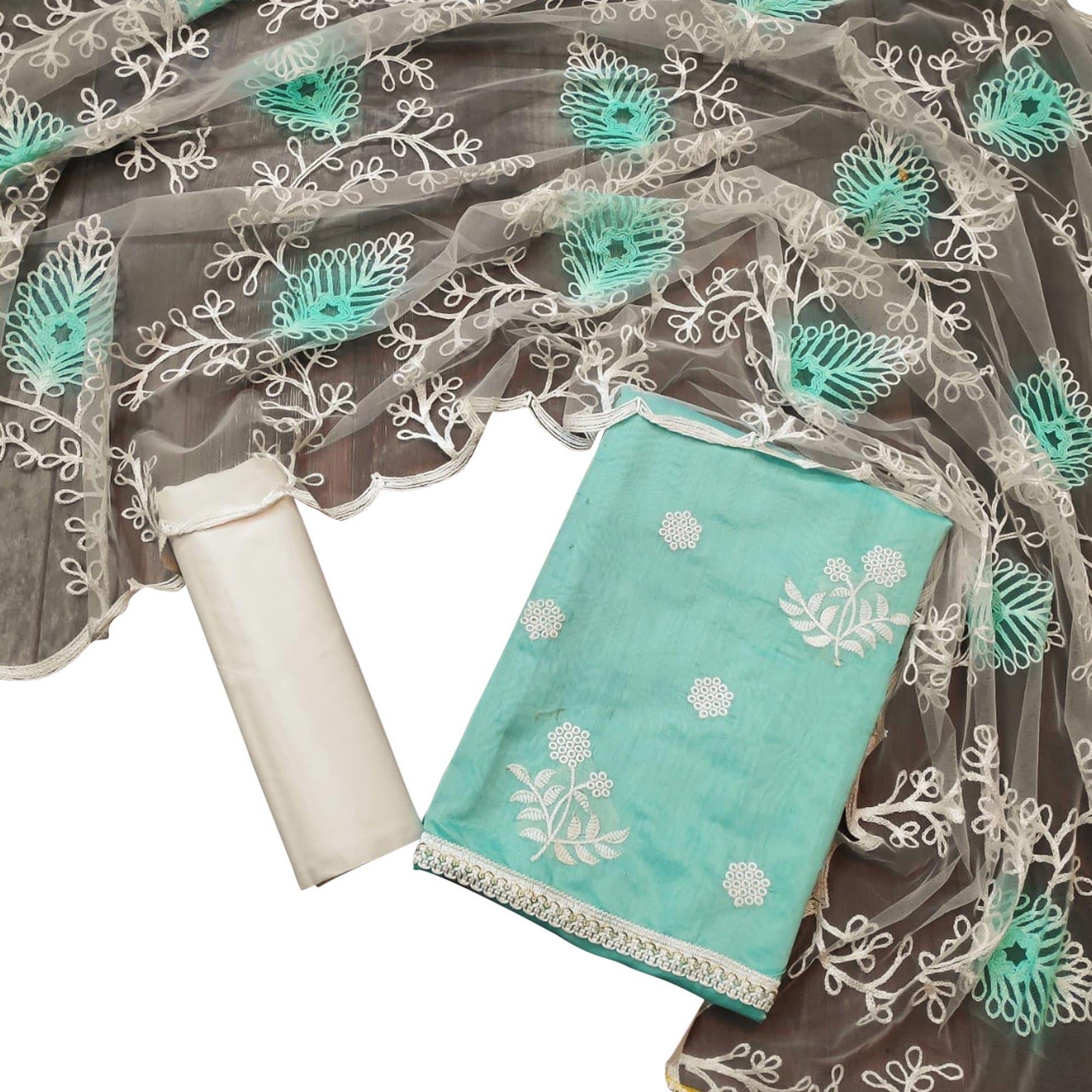 Demanding Pastel Blue Colored Casual Embroidered Chanderi Dress Material