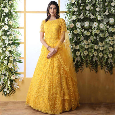 Demanding Yellow Colored Party Wear Embroidered Net Gown With Dupatta