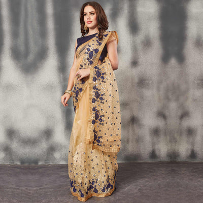 Desirable Beige Navy Blue Colored Partywear Embroidered Netted Saree