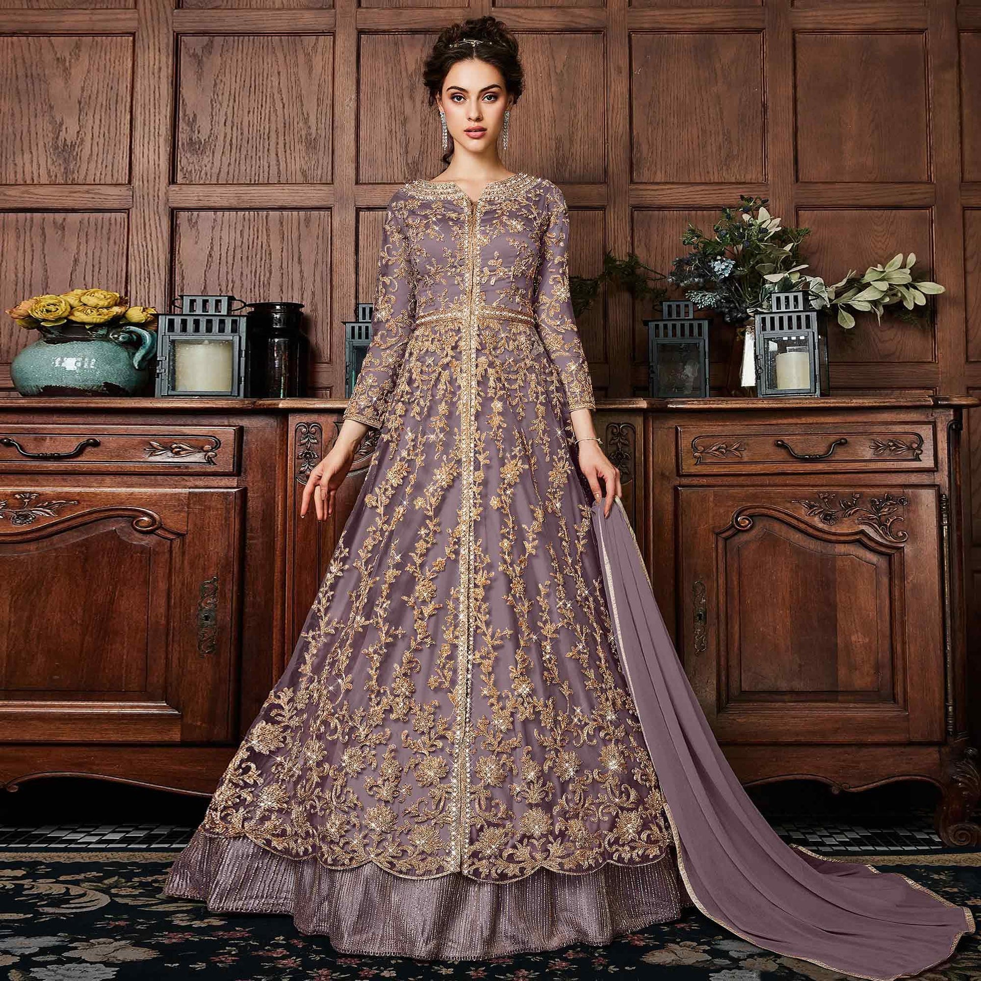 Desirable Dark Mauve Colored Partywear Embroidered Netted Anarkali Suit