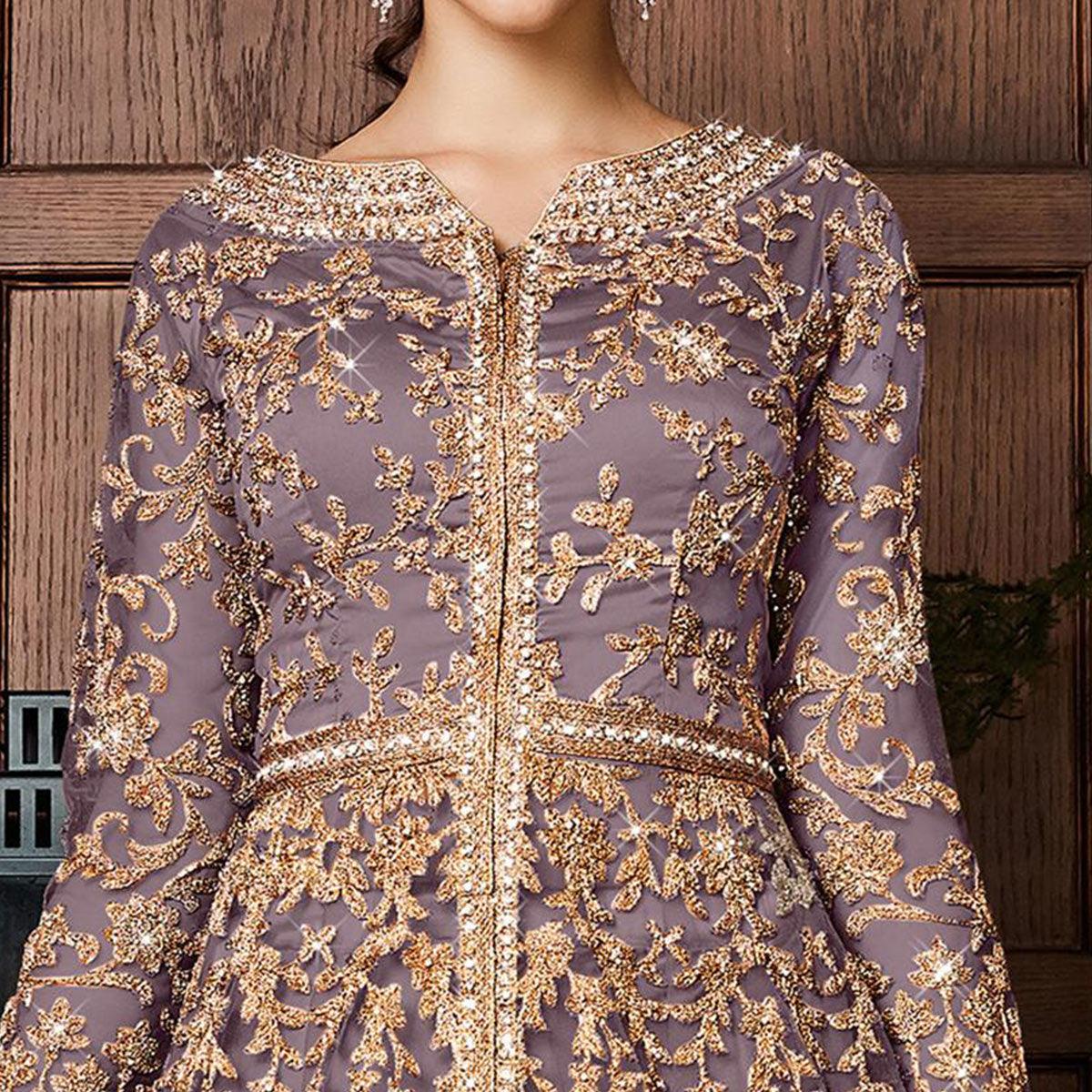 Desirable Dark Mauve Colored Partywear Embroidered Netted Anarkali Suit