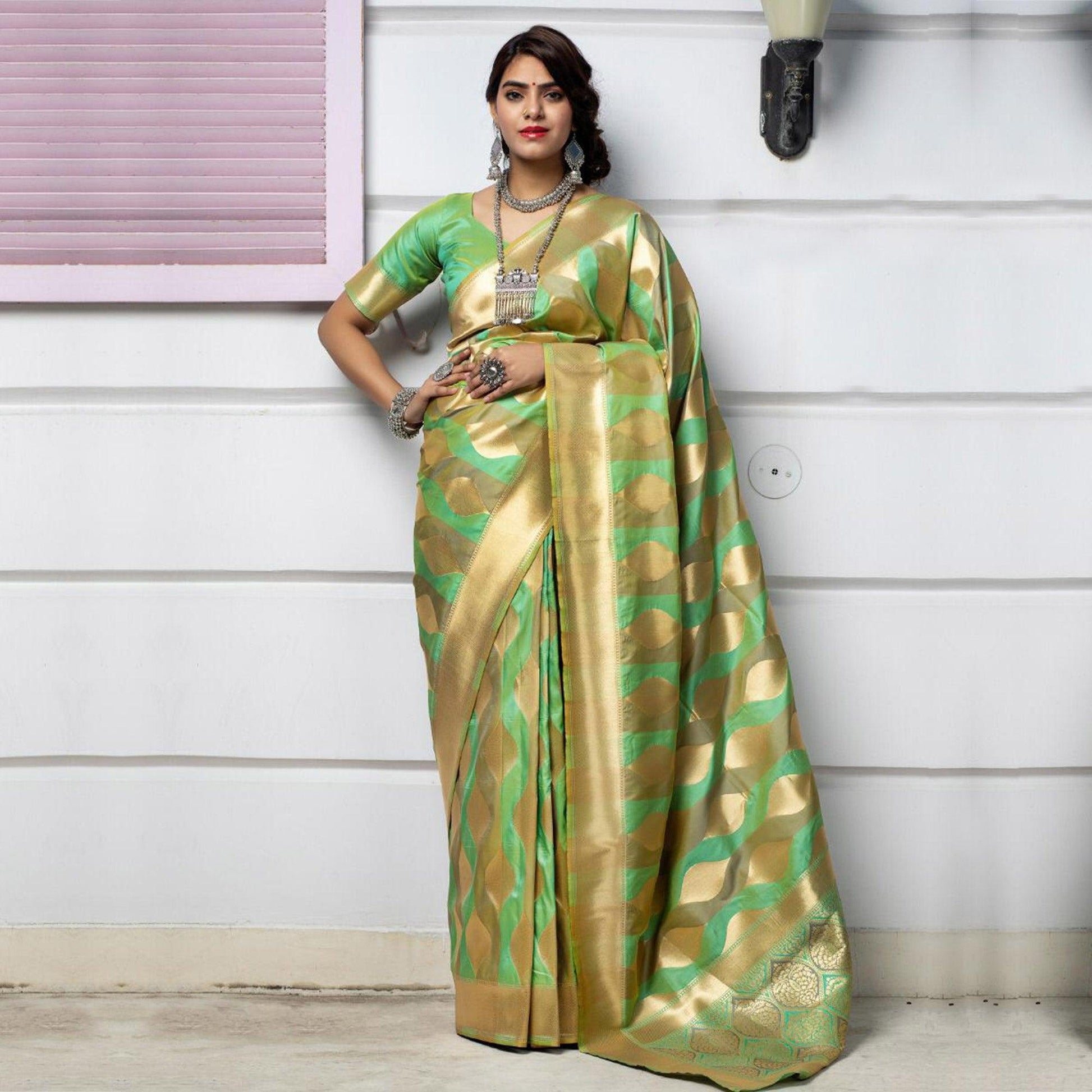 Desirable Green Colored Festive Wear Woven Banarasi Silk Saree