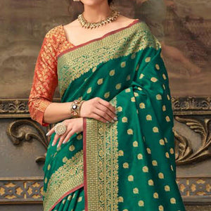 Desirable Green Colored Festive Wear Woven Handloom Silk Saree