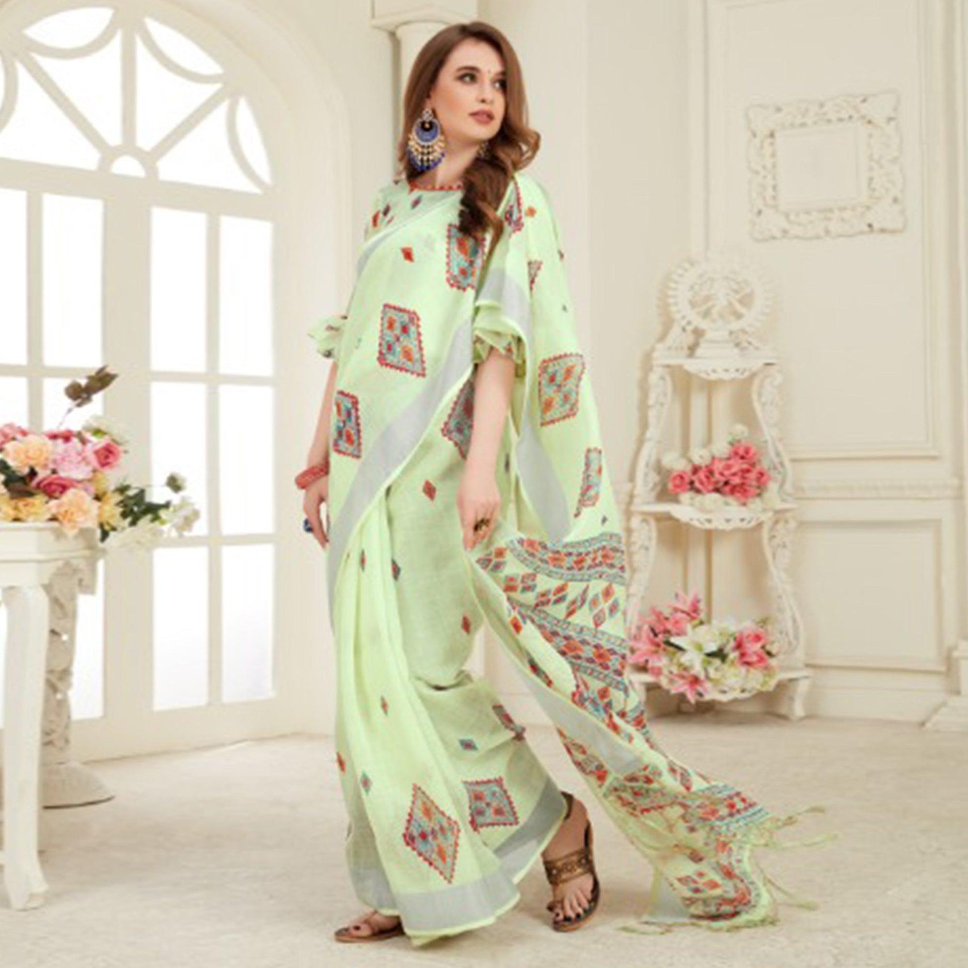 Desirable Light Green Colored Casual Printed Linen Saree With Tassels