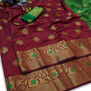 Desirable Maroon Colored Festive Wear Woven Lichi Silk Saree