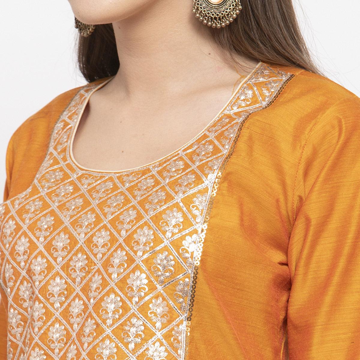 Desirable Orange Colored Party Wear Embroidered Calf Length A-Line Cotton-Chanderi Silk Kurti-Pant Set