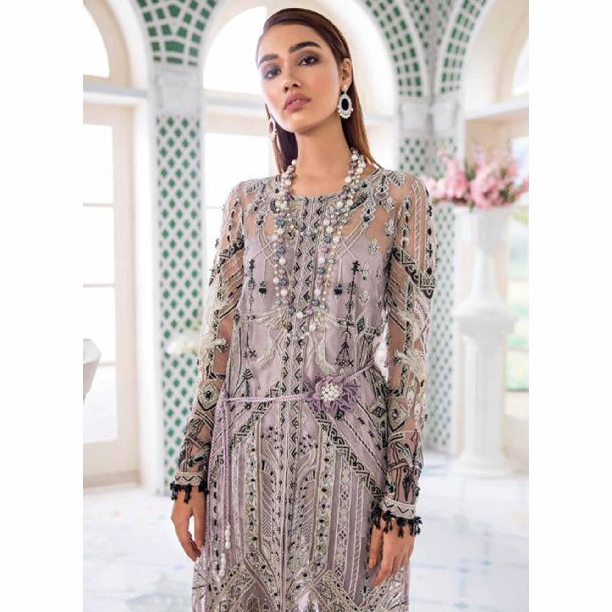 Desirable Pastel Purple Colored Party Wear Embroidered Net Palazzo Suit