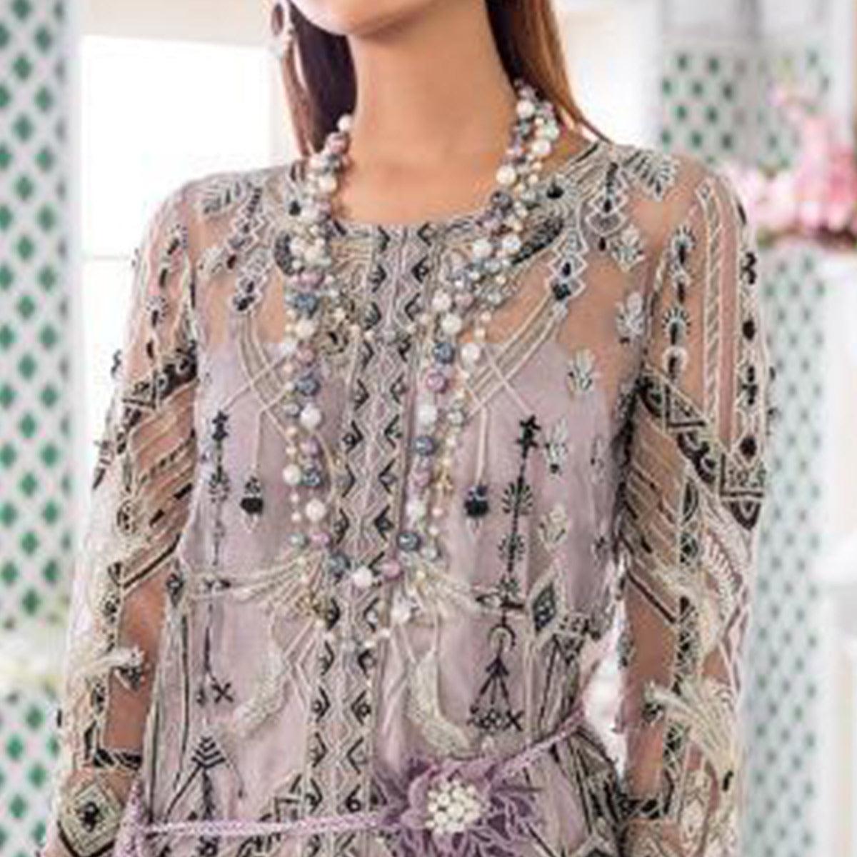 Desirable Pastel Purple Colored Party Wear Embroidered Net Palazzo Suit