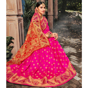 Desirable Pink Colored Festive Wear Woven Banarasi Silk Saree With Tassels