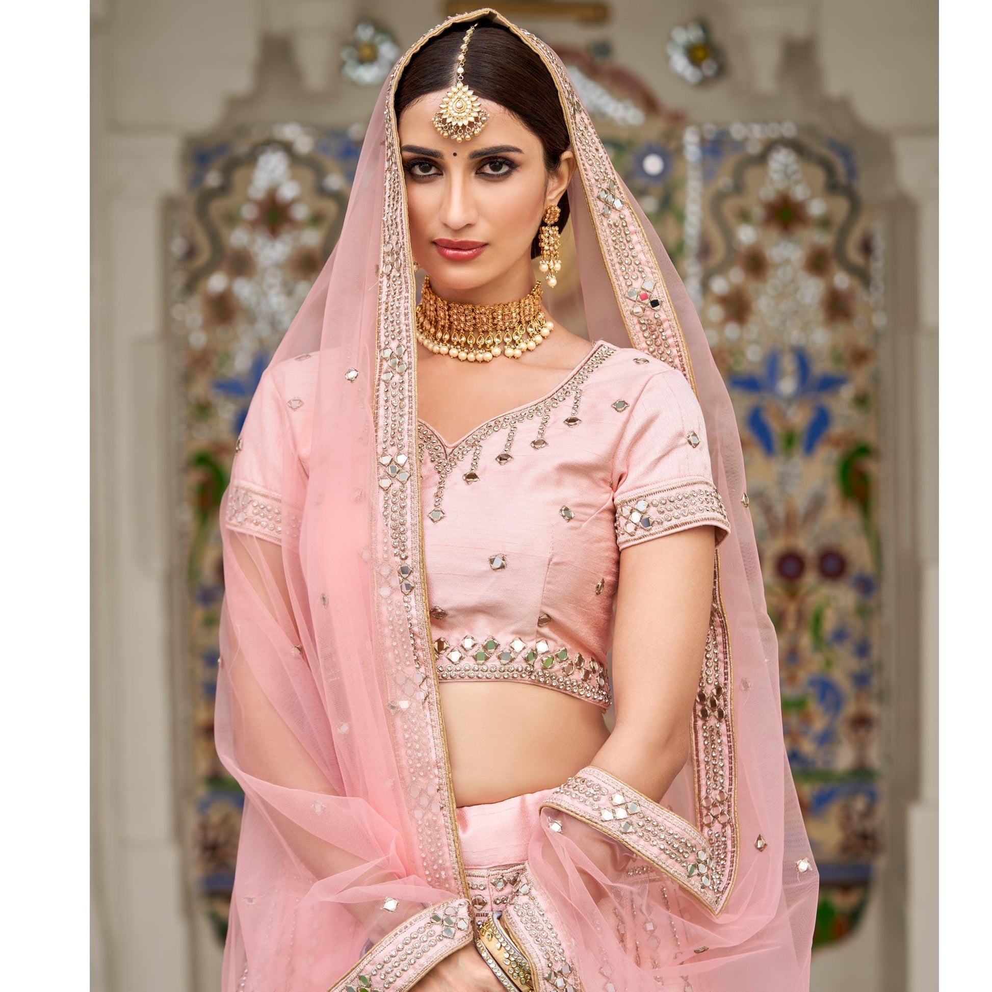 Desirable Pink Coloured Wedding Wear Mirror Work Heavy Silk Lehenga Choli