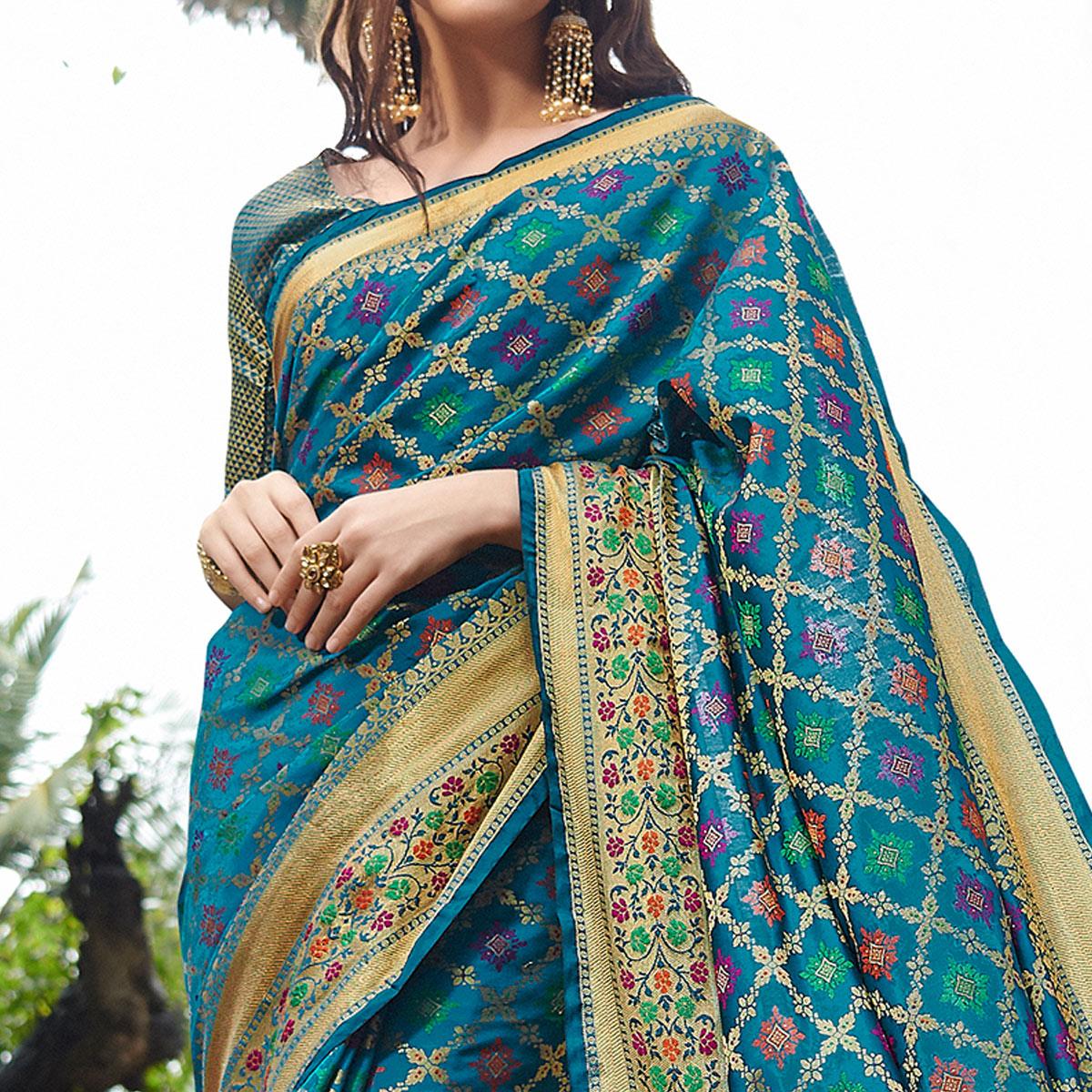 Desirable Turquoise Blue Colored Festive Wear Woven Silk Saree