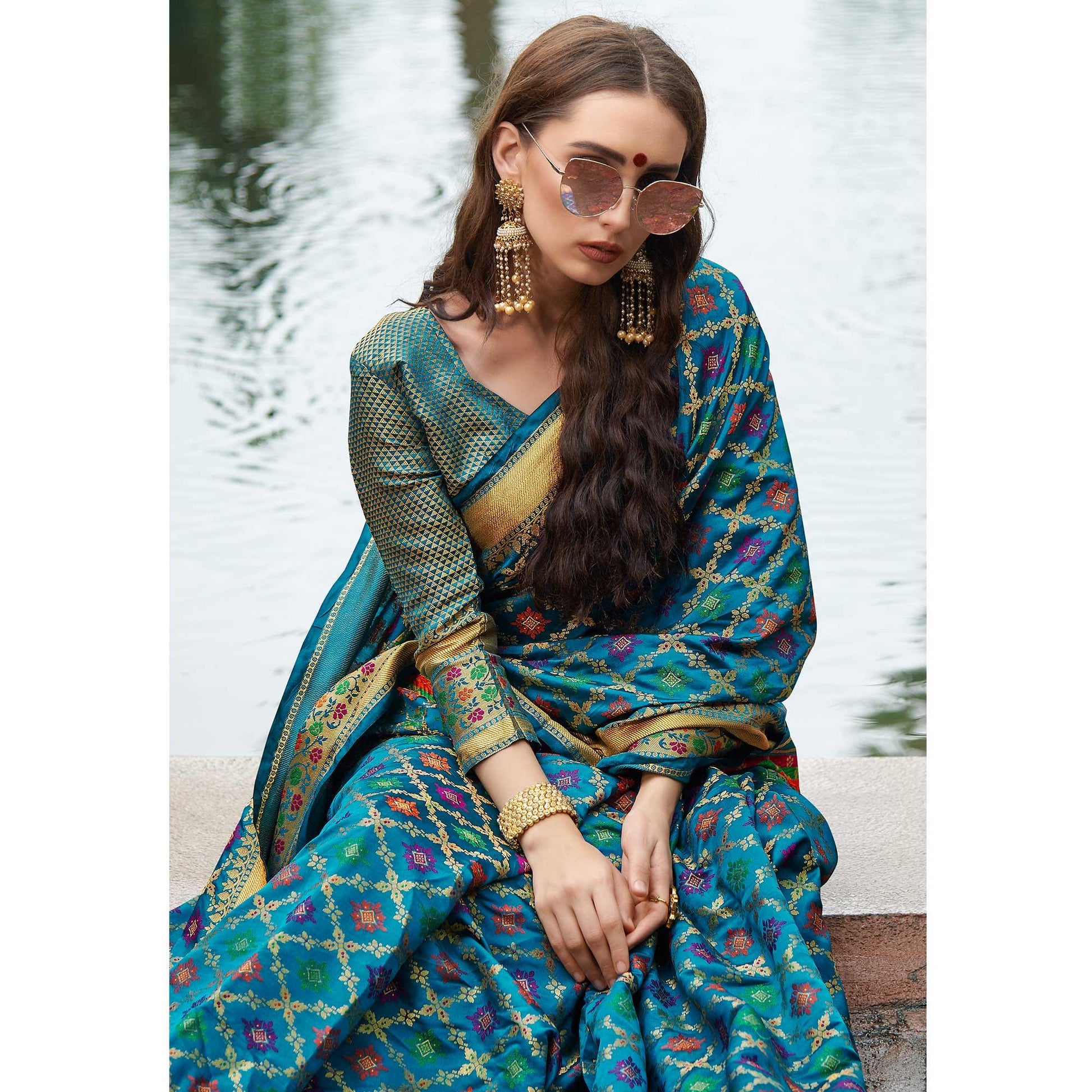 Desirable Turquoise Blue Colored Festive Wear Woven Silk Saree