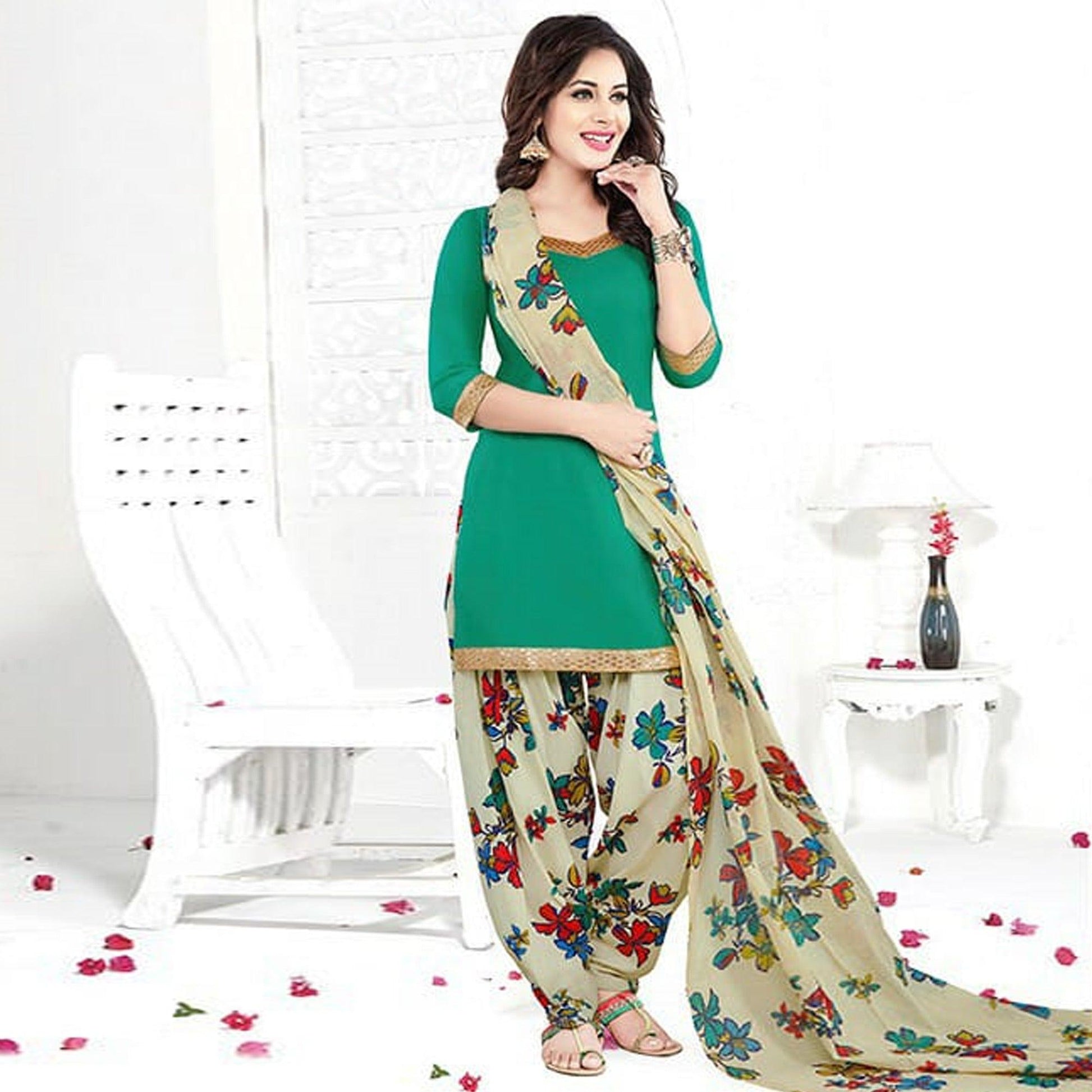 Desirable Turquoise Green Colored Casual Printed Crepe Patiala Dress Material