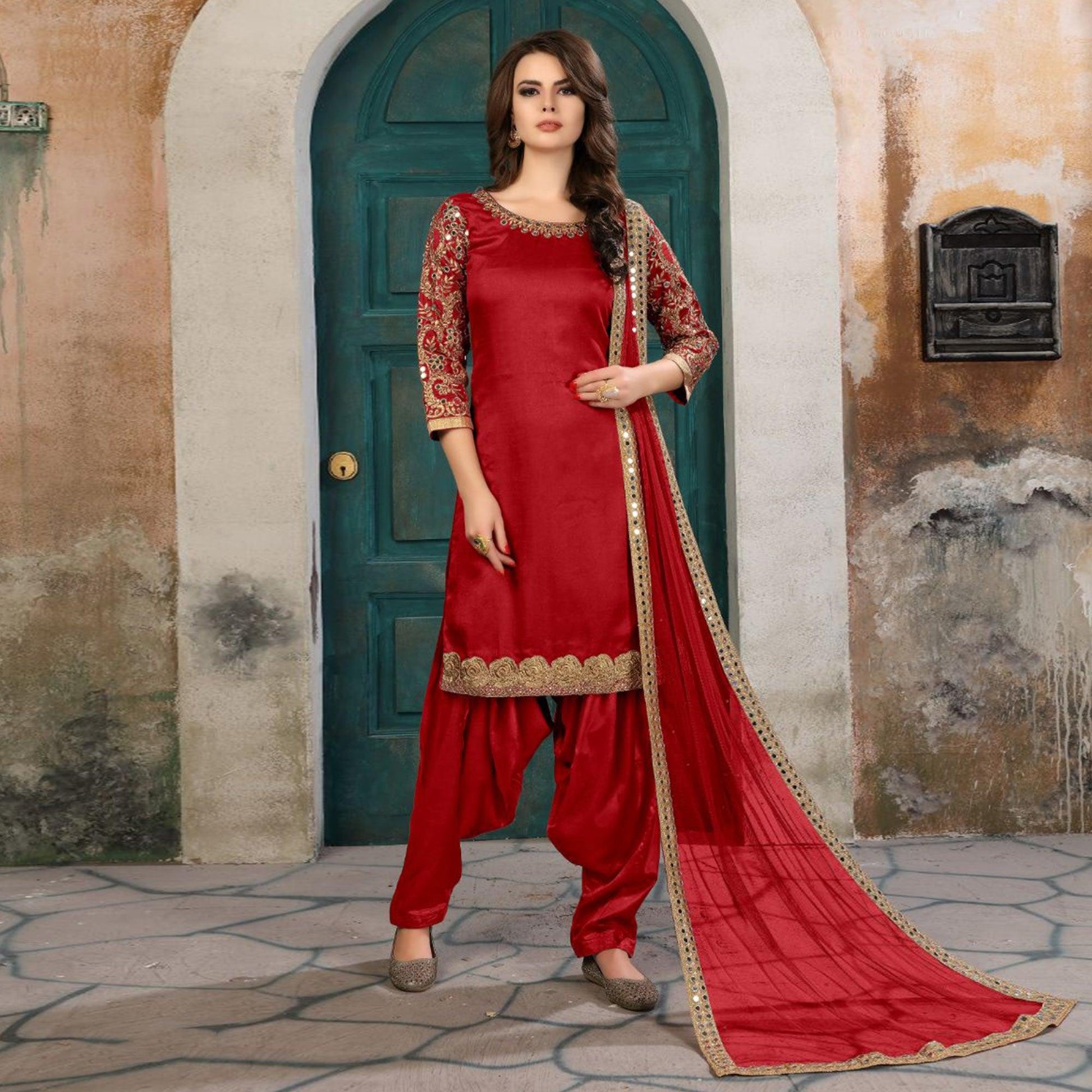 Desiring Red Colored Partywear Embroidered Art Silk Salwar Suit