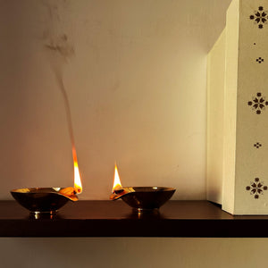 Kuber brass diya (set of 4) in Ivory gift box
