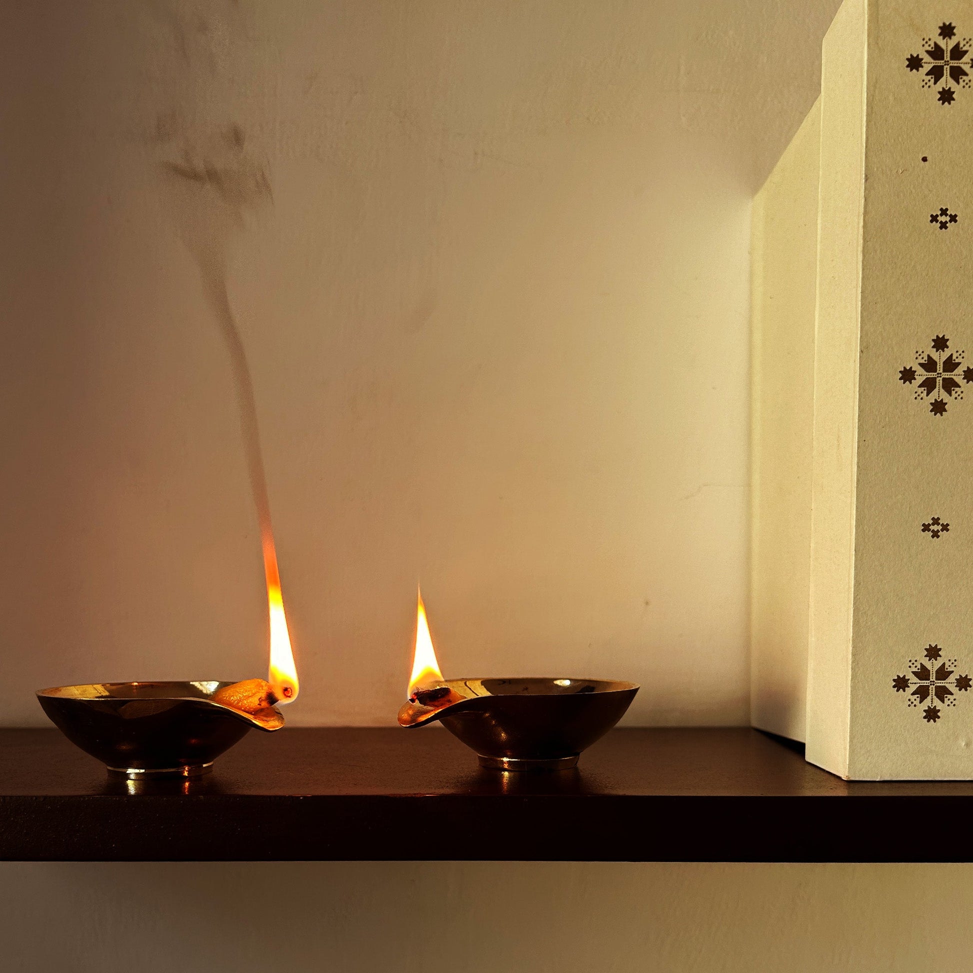 Kuber brass diya (set of 4) in Ivory gift box