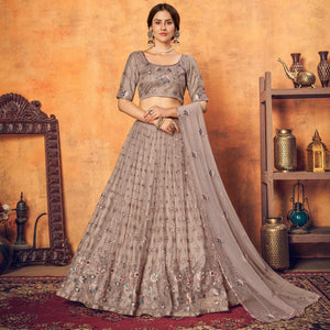 Dusty Brown Festive Wear Thread With Floral Sequins Embroidered Net Lehenga Choli