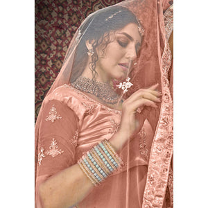 Dusty Pink Partywear Multi Sequins Embroidered Net Lehenga Choli
