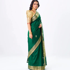 Dark Green Handloom Banarasi Silk Saree With Gold & Silver Zari Buttas