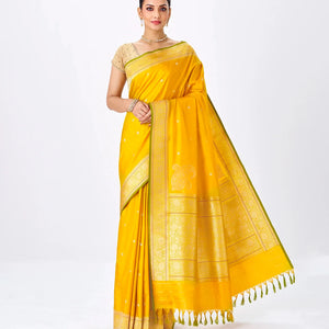 Mustard Handwoven Banarasi Silk Saree With Floral Motifs & Corner Buttas