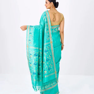 Turquoise Handloom Uppada Silk Saree With Meena Floral Motifs in Border