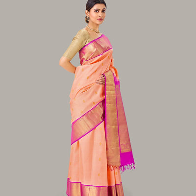 Light Peach Handloom Kanchipuram Korvai Silk Saree With Zari Buttas
