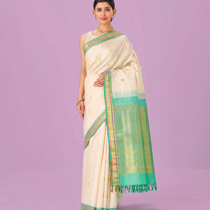 Cream Handloom Kanchipuram Silk Saree With Zari Buttas & Contrast Border