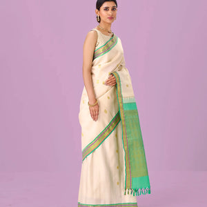 Cream Handloom Kanchipuram Silk Saree With Zari Buttas & Contrast Border