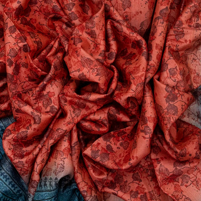 Red Tussar Silk Saree Is Printed With Floral Motifs