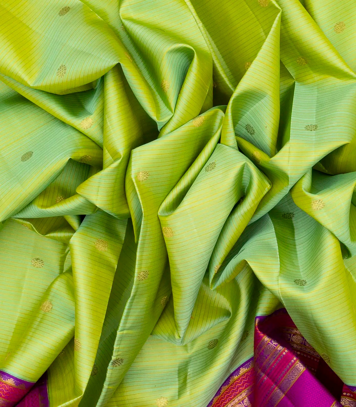Cardamom Green Handloom Kanchipuram Korvai Silk Saree With Zari Stripes & Buttas