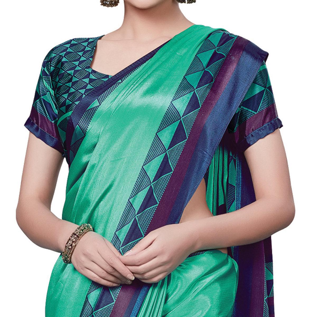 Elegant Aqua Green Colored Casual Wear Printed Crepe Saree