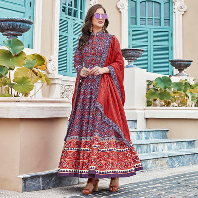 Elegant Blue Colored Partywear Patola Printed Silk Anarkali Suit