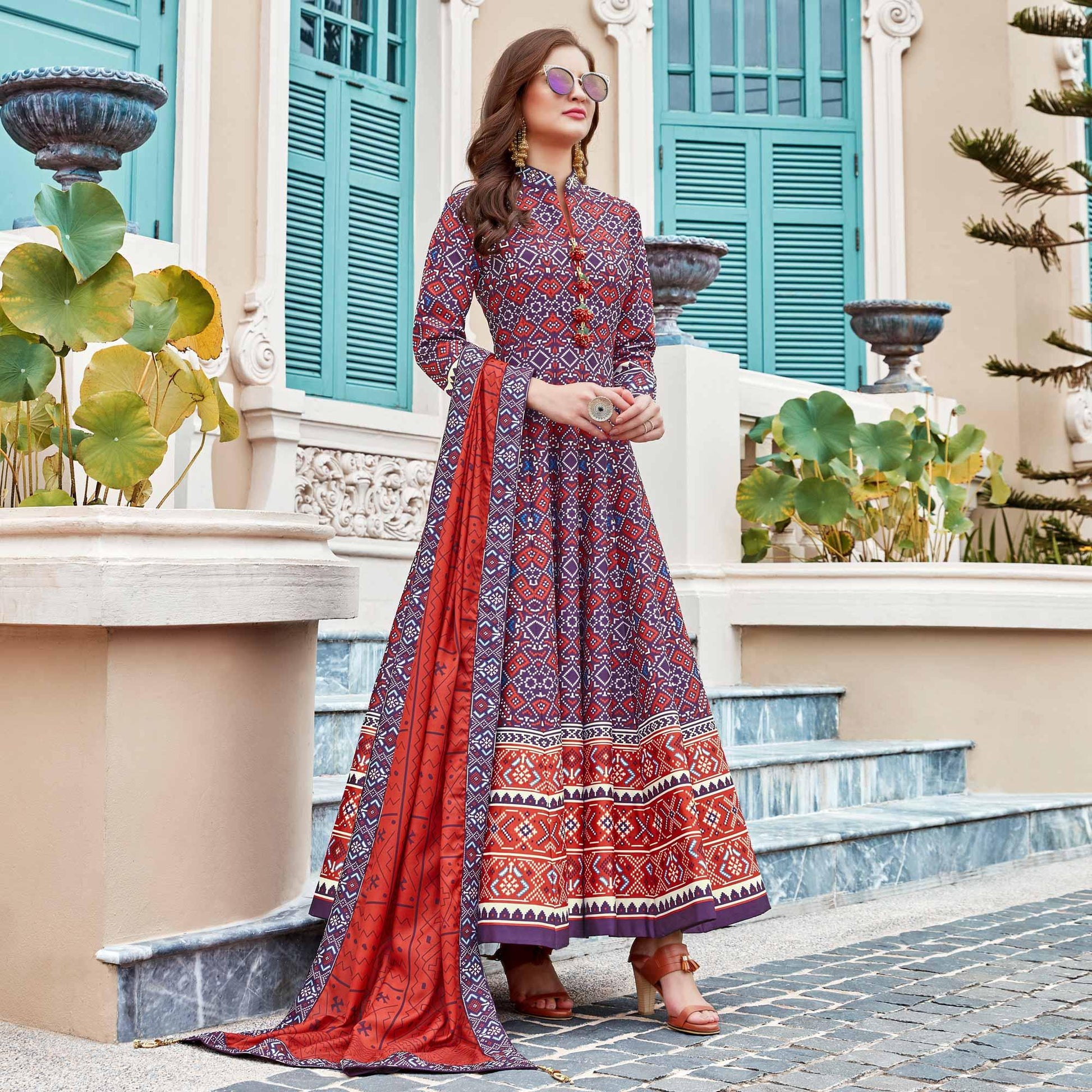 Elegant Blue Colored Partywear Patola Printed Silk Anarkali Suit