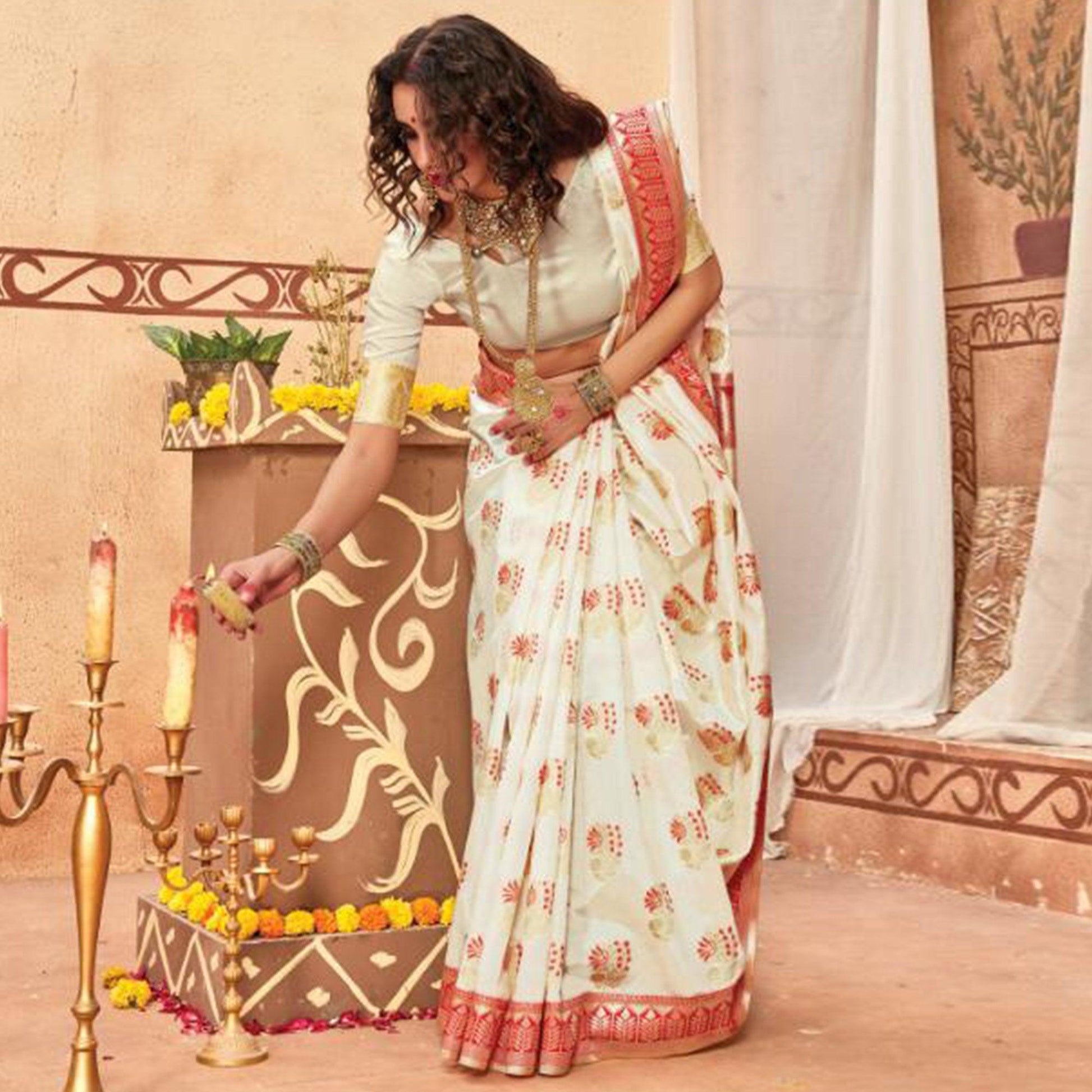 Elegant Cream Colored Festive Wear Woven Silk Blend Saree With Tassels