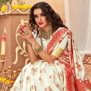 Elegant Cream Colored Festive Wear Woven Silk Blend Saree With Tassels