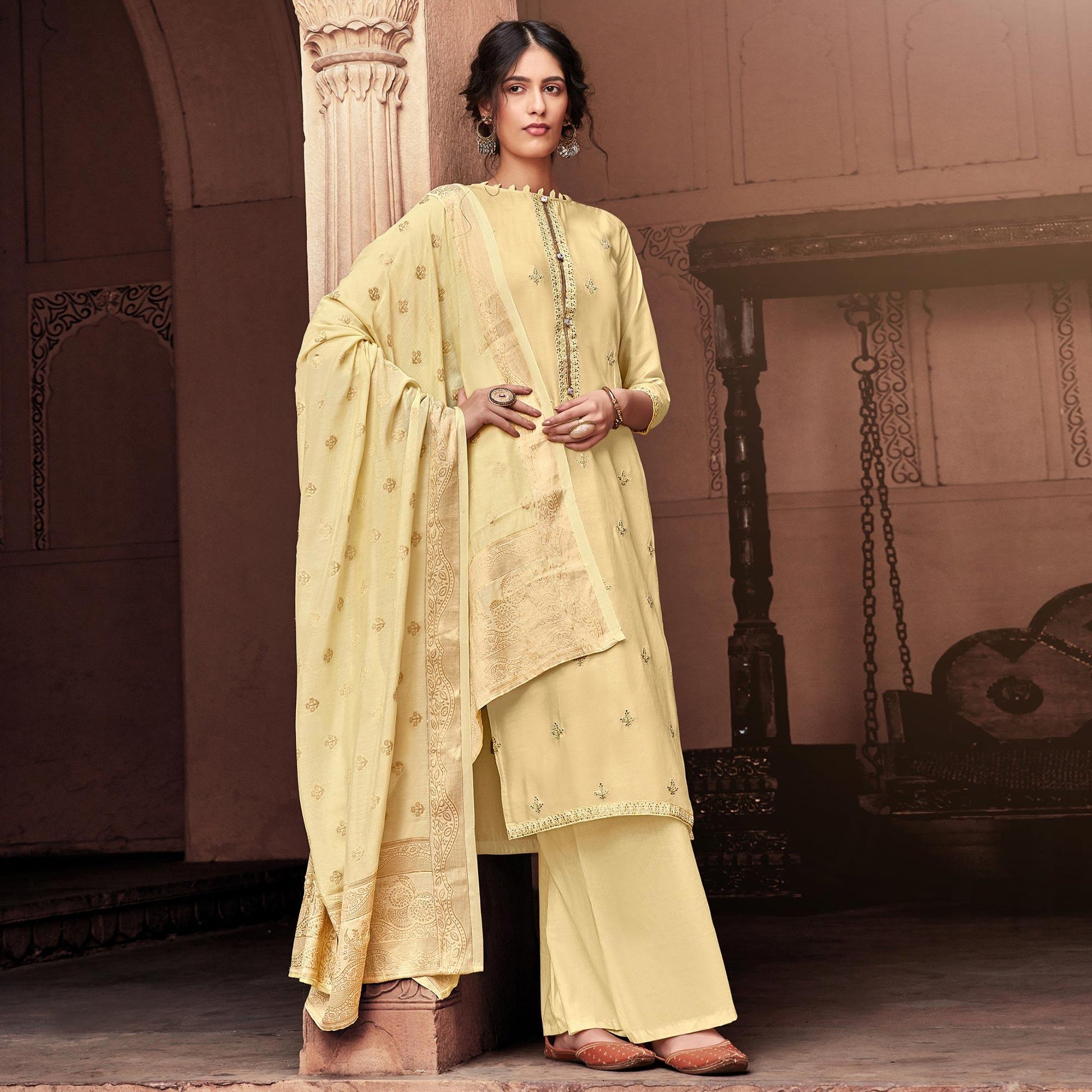 Elegant Cream Colored Partywear Embroidered Viscose Muslin Palazzo Suit