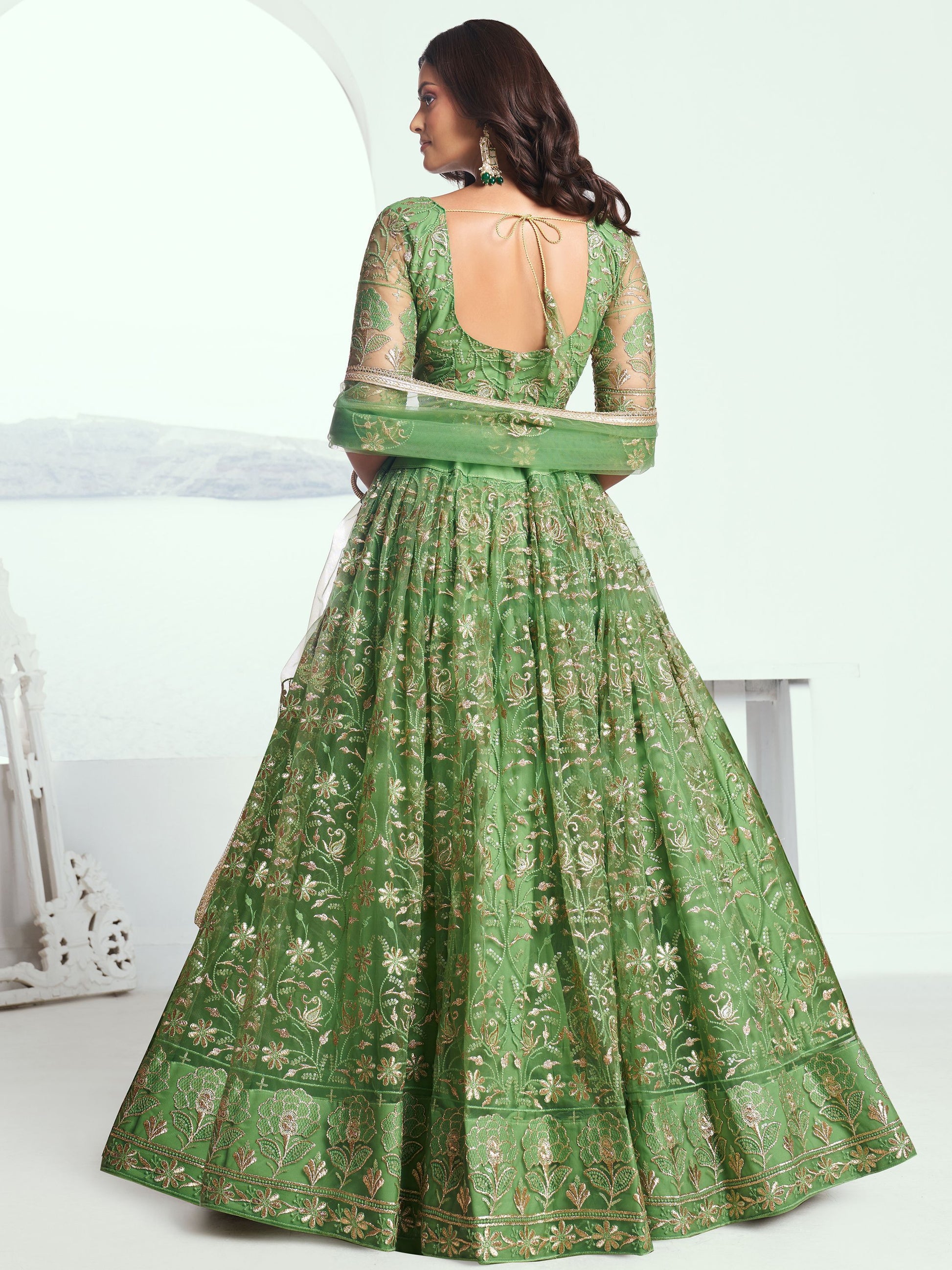Elegant Green Embroidered Net Mehendi Lehenga Choli