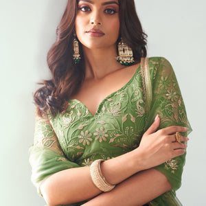 Elegant Green Embroidered Net Mehendi Lehenga Choli