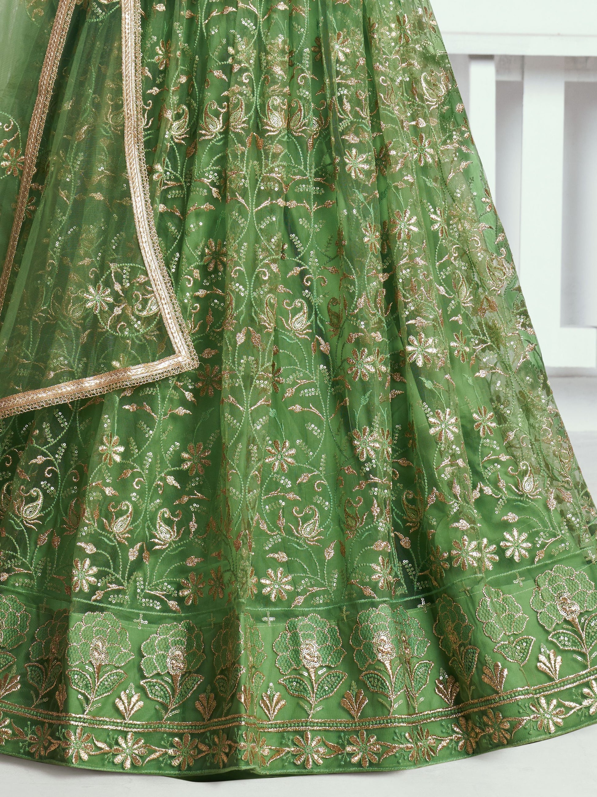 Elegant Green Embroidered Net Mehendi Lehenga Choli