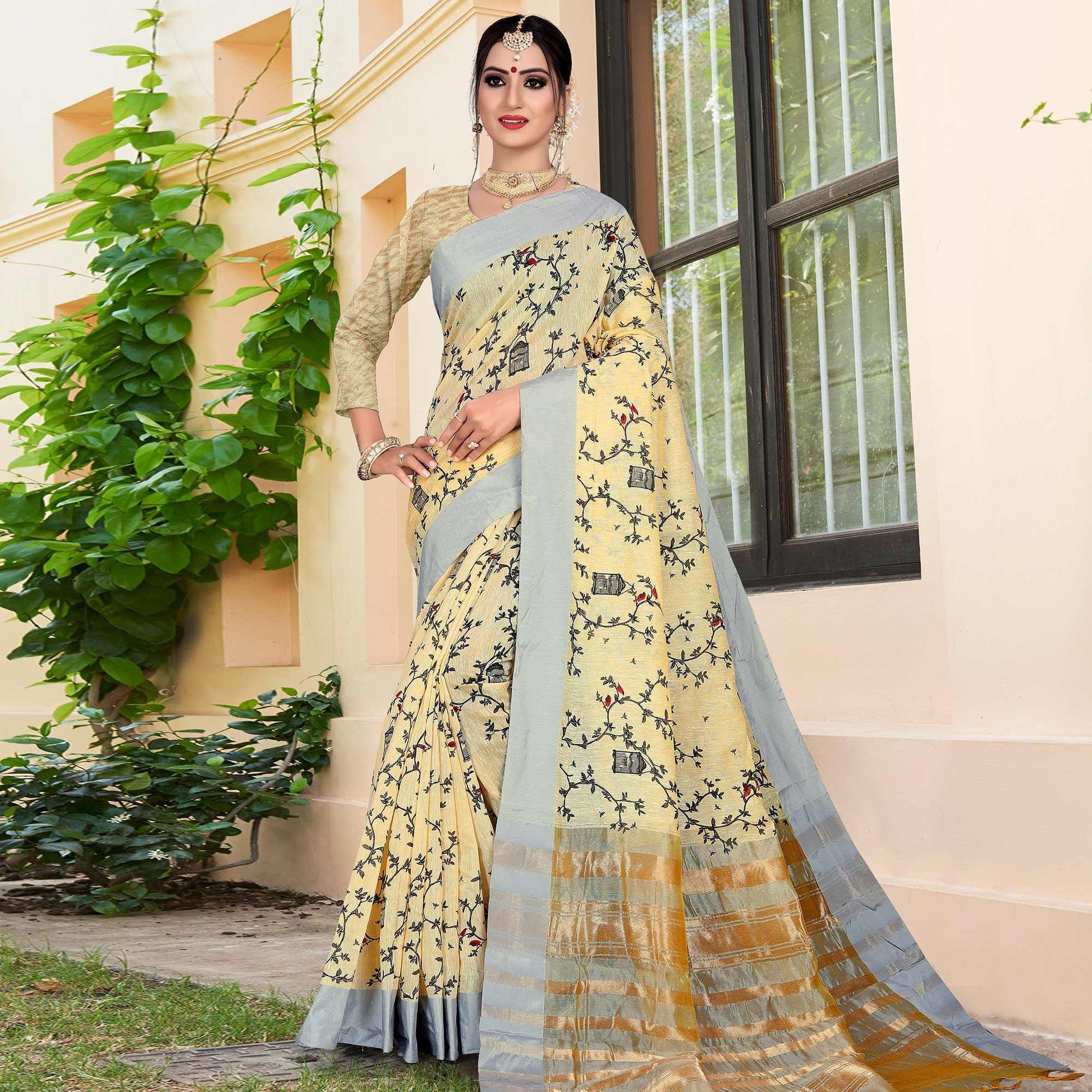 Elegant Light Yellow Colored Casual Printed-Woven Linen Saree With Tassels