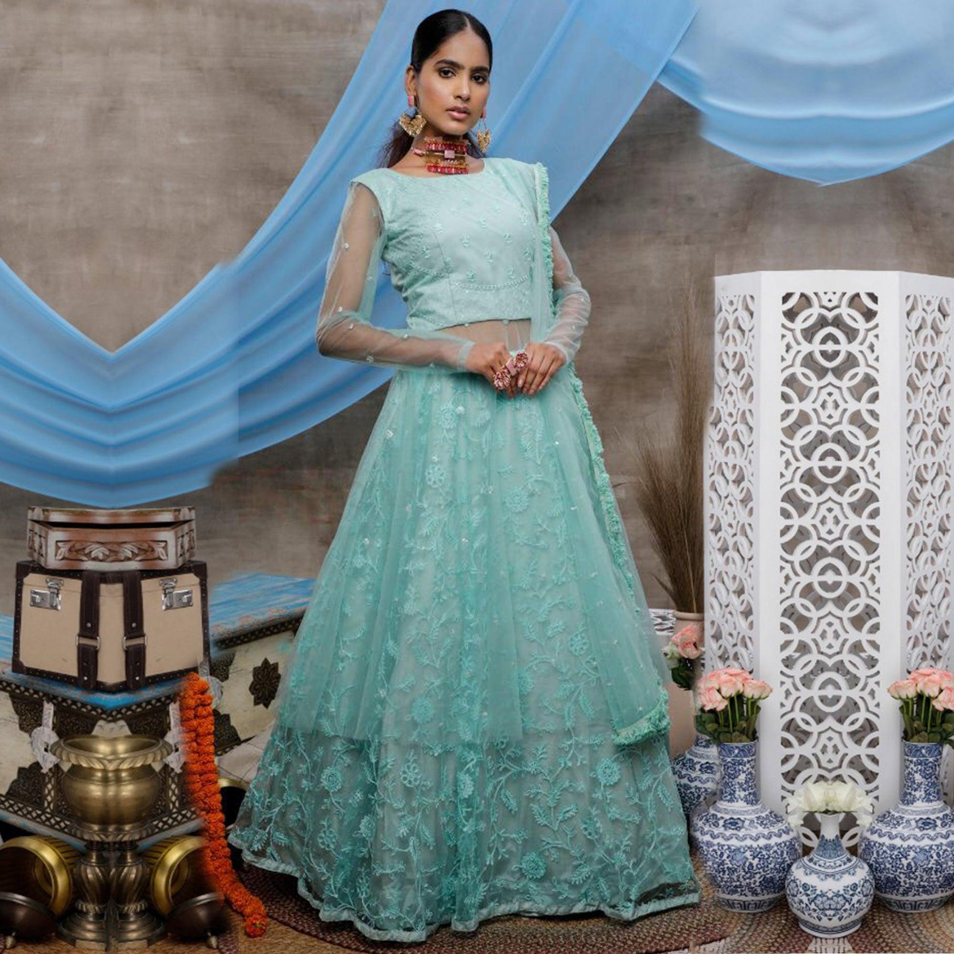 Elegant Mint Green Colored Party Wear Embroidered Net Lehenga Style Gown