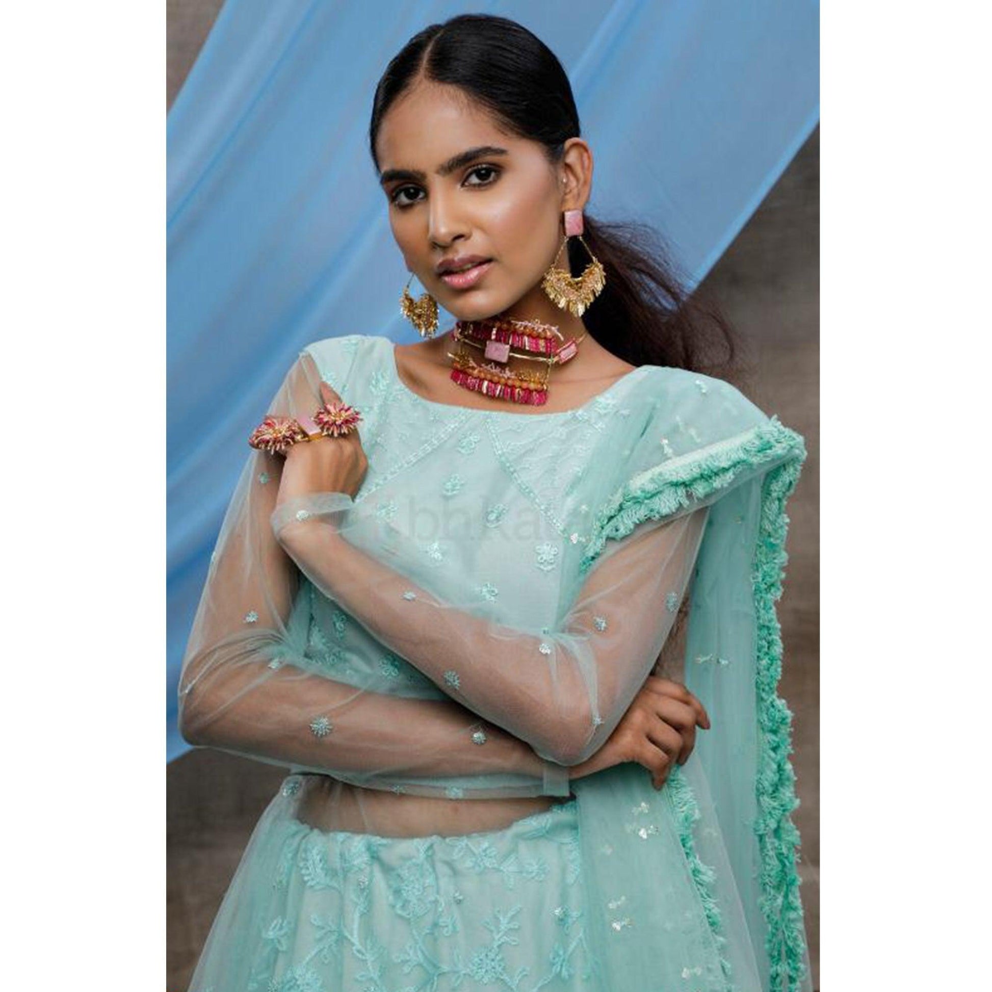 Elegant Mint Green Colored Party Wear Embroidered Net Lehenga Style Gown