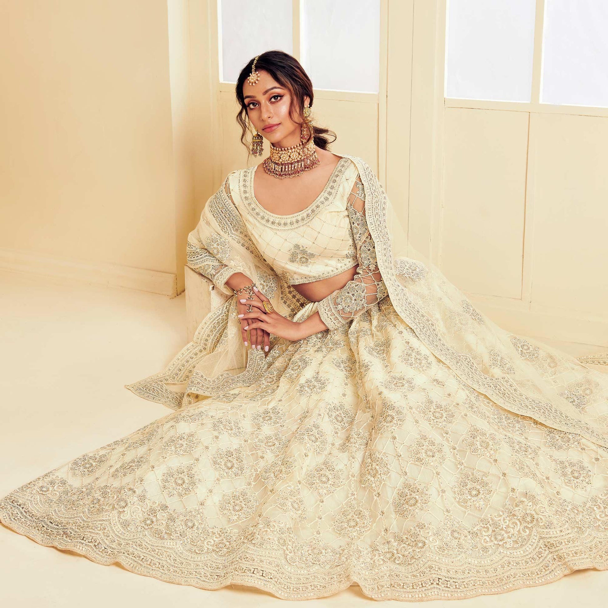 Elegant Off White Coloured Wedding Wear Cording Embroidered Net Lehenga Choli