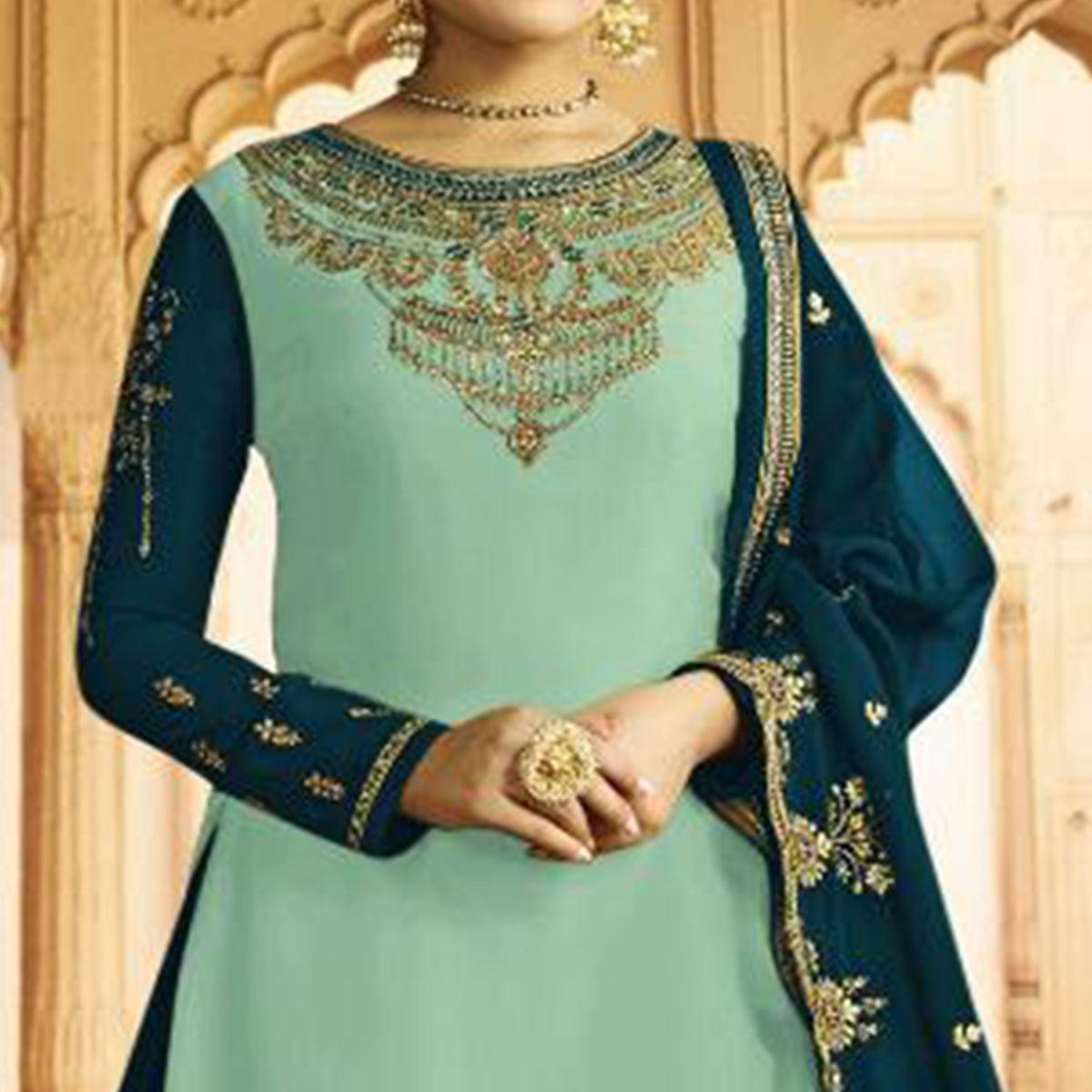 Elegant Sky Blue Colored Partywear Embroidered Georgette Satin Lehenga Kameez