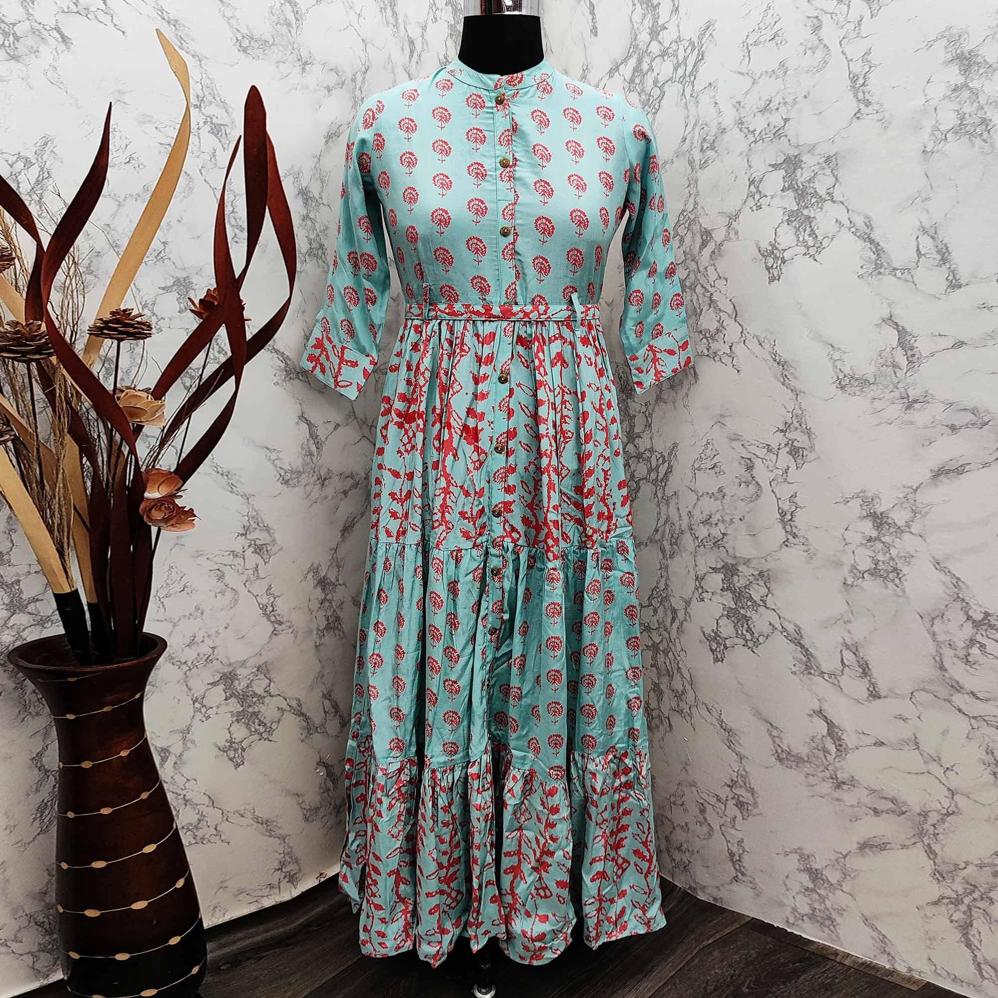 Elegant Turquoise Green Colored Partywear Printed Anarkali Style Cotton Silk Long Kurti