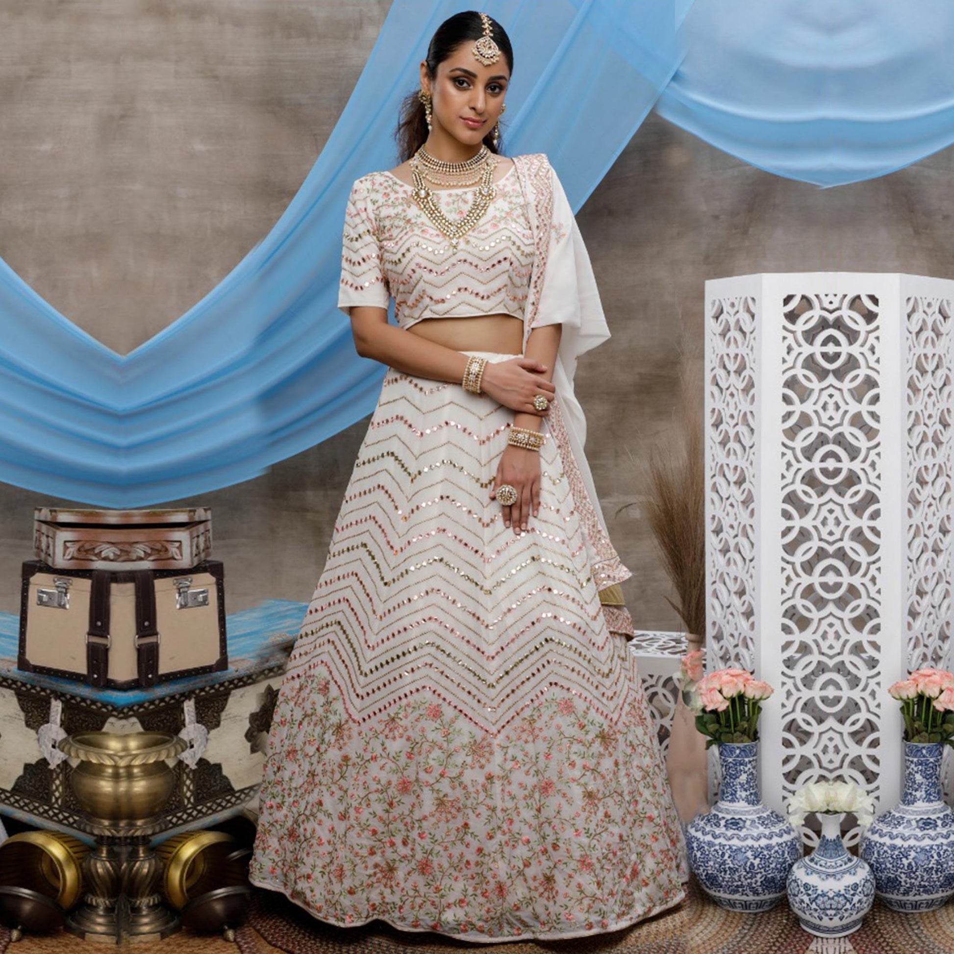 Elegant White Colored Party Wear Embroidered Georgette Lehenga Choli