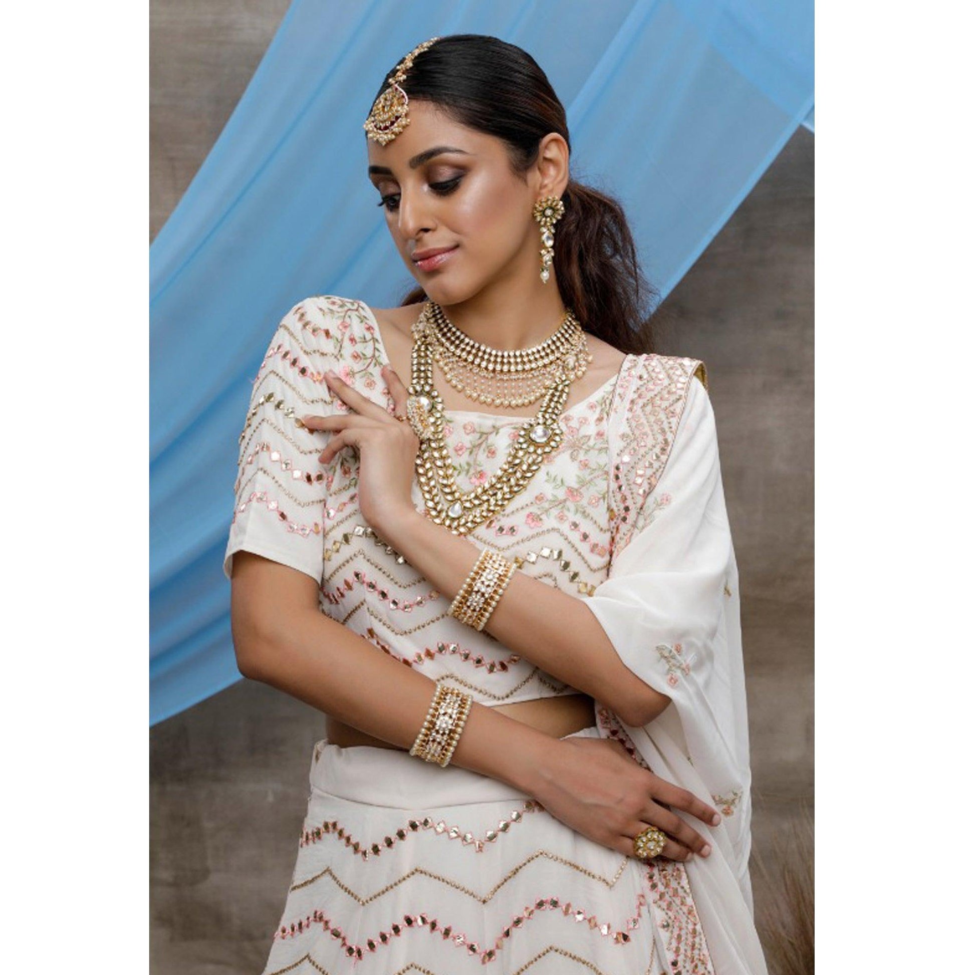 Elegant White Colored Party Wear Embroidered Georgette Lehenga Choli