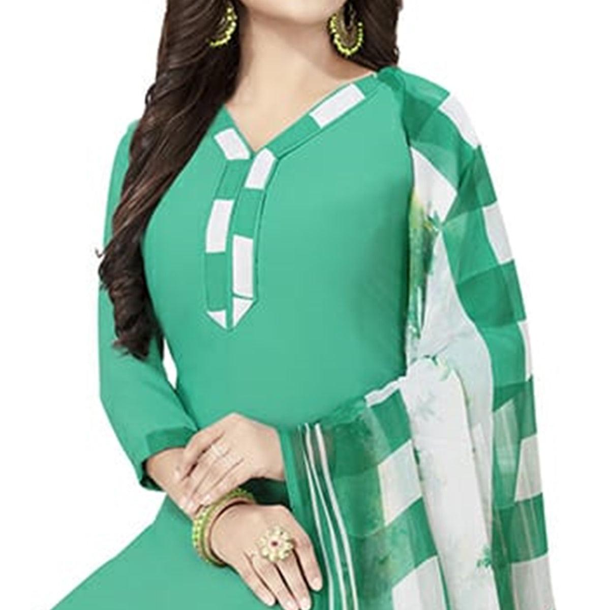 Energetic Aqua Green Colored Casual Printed Crepe Patiala Dress Material